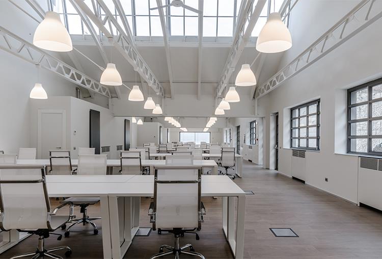 L'harmonie de couleurs et de surfaces de Panaria Ceramica pour le hangar de « A&B »